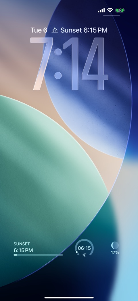 Meridian's widgets on the Lock Screen: sunset at 6:15 PM above the clock, and the sunset, the sun's progress, and the moon 17% lit below it